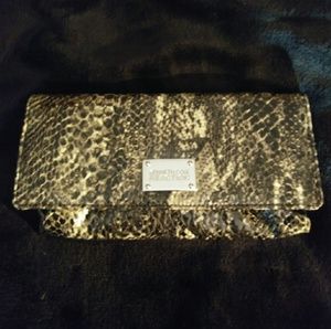 Lizard like Kenneth Cole clutch or wallet